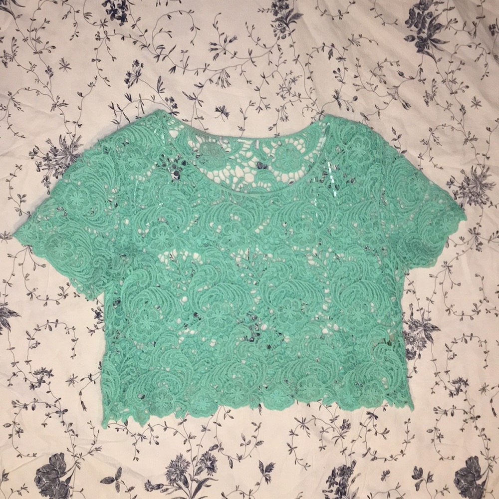 Delia’s teal Lacey short sleeve shirt